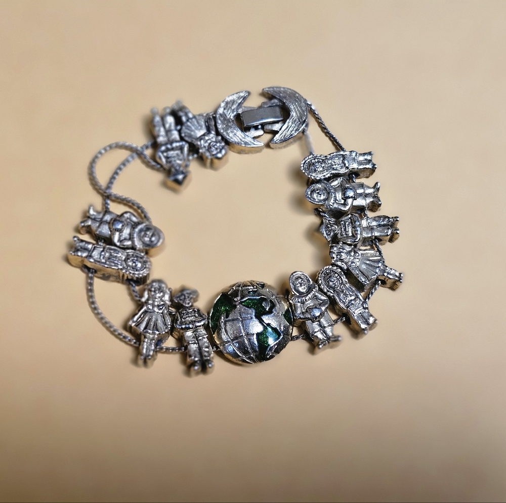 World and ethnic bracelet silver tone